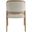 Back view showing curved wood frame and full upholstery of Avaline Arm Chair
