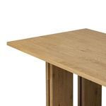 Close-up of the base legs showing the layered panel construction in oak veneer