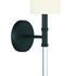 Side angle showing arm extending from round wall plate on black Fremont sconce