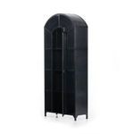 Black cabinet door corner and leg detail showing paneled metal frame and square tapered leg