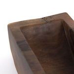 Close-up inside view showing smooth carved wood surface and subtle natural cracks at the rim