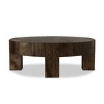 Round coffee table with thick-cut oak veneer and faux rustic wormwood oak finish featuring chunky square legs and dovetail...