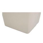 Low angle showing base fabric wrapping and subtle curved corner near floor level