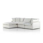 Stevie 3 Piece Sectional Sofa with Ottoman in light performance fabric, left arm-facing with plush feather-blend cushions