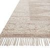 Close-up side view showing wool, cotton, and jute fibers with tasseled edge and flatweave texture