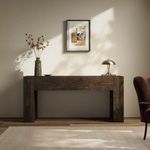 Abaso Console Table in a styled room setting with artwork, decorative items, and soft natural light