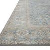 Side angle view focusing on rug’s edge, showing detailed border and low-profile pile