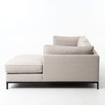 Profile side view of sectional sofa with chaise on left, clean square arm