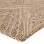 Corner close-up showing tight diagonal weave patterns and thick braided jute edge