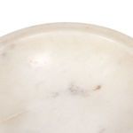 Close-up of marble surface inside bowl showing natural color variations and patterns