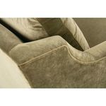 Close-up on Madeline Chair’s subtly curved upper armrest and side cushion seam details in olive velvet