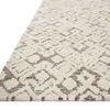 Close-up angled view focusing on rug's mix of low and high pile textures and edge detailing