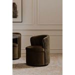 Group of four green Dane swivel dining chairs arranged around black dining table