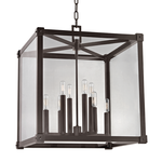 Forsyth 8 Light Pendant chandelier with metal frame and clear glass panels surrounding eight candle-style lights