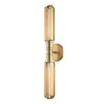 Brushed brass two-light wall sconce with Edison bulbs encased in elongated rectangular frames and circular wall mount