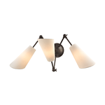 Buckingham 3 Light Wall Sconce with dark metal arms and cream tapered fabric shades angled outward
