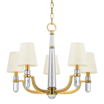 Dayton 5 Light Chandelier with brass arms, clear crystal accents, and white fabric shades on each bulb