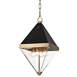 Coltrane 4 Light Pendant with black textured metal upper half, clear acrylic lower half, and polished band around middle