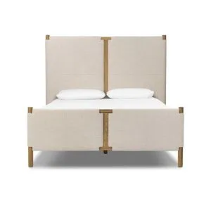 Salado Bed with upholstered cream fabric panels and warm wood posts on headboard and footboard, clean lines