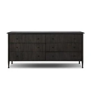 Dark wood Paula dresser with six vertically reeded drawers and slim tapered legs