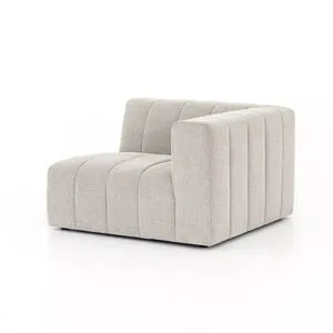 Sandstone-colored Langham channeled sectional piece with wide vertical channels and low Italian-inspired styling