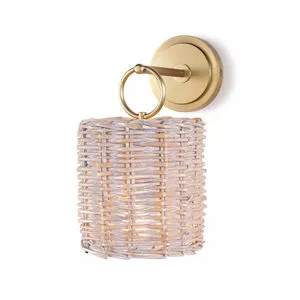 Nantucket Sconce with a handwoven rattan basket shade and natural brass circular backplate wall light