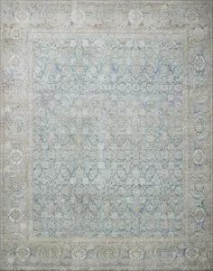 Traditional Wynter Ocean Silver rug with intricate blue and beige floral pattern and textured finish
