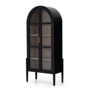 Closed cabinet showing arched glass doors with brass handles and solid oak interior seen through doors