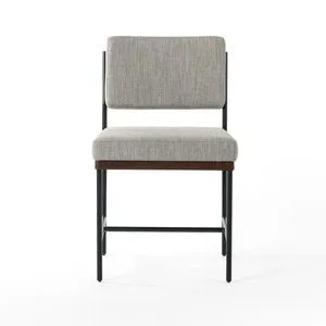 Chair shown from front on a white background highlighting clean lines and subdued color palette