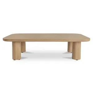 Full profile view of Anders coffee table showing all four cylindrical legs and smooth surface