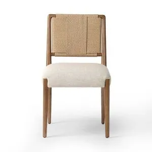 Rothler Dining Chair viewed straight on showing full front view of woven backrest and cushioned seat