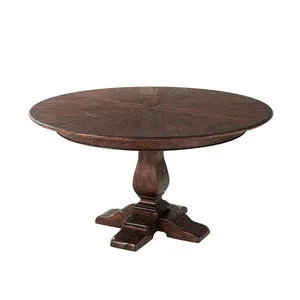 Round Victory Oak Jupe Dining Table with dark brown oak veneer top and a sturdy carved mahogany pedestal base