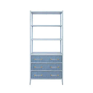 Flynn Etagere bookcase with bamboo-inspired light blue frame, grasscloth textured drawers, and gold handles