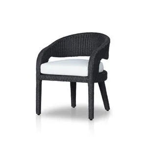 Black woven barrel-back outdoor dining chair with a white cushioned seat