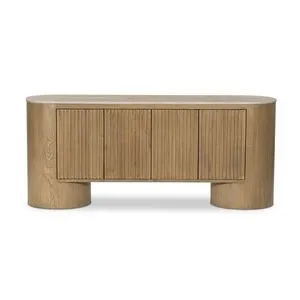 Giovani Media Console with rounded oversized oak base, fluted ribbed oak doors, and natural travertine top