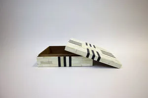 Box with lid partially open showing the interior lined in brown fabric