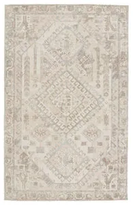 Handwoven Arlowe rug with light brown and pink medallion geometric tribal pattern on soft textured wool and bamboo rayon