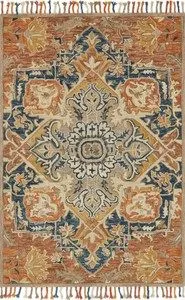 Zharah Zr 10 rug in rust and blue with intricate central medallion and floral motifs on 100% wool pile with fringed edges.