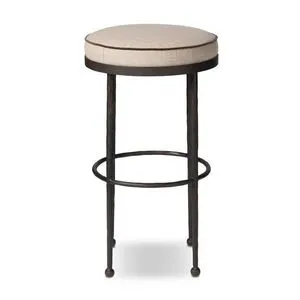 Corinne Stool with round cushioned performance fabric seat, hammered iron legs, and ball-shaped foot details