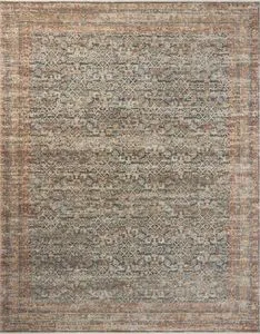 Heritage Blue / Rust Rug with vintage-inspired muted blue and rust multicolor motifs and a textured, variable-pile surface