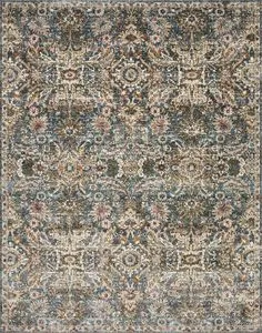 Saban Blue Sand Rug with traditional-inspired floral motifs in muted blue, sand, and rust tones