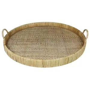 Large round woven rattan tray with raised edges and two loop handles on wood frame