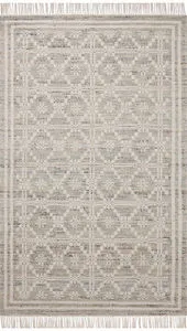Ivory Rivers Lagoon rug with a modern flatweave reversible symmetrical motif pattern and soft watercolor effect