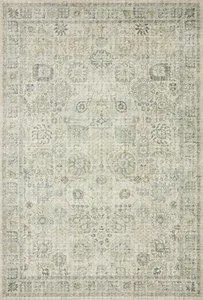Traditional rectangular Skye Natural Sage rug with faded old-world floral patterns in muted green and beige tones