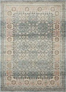 Jocelyn Sky Multi vintage style rug with faded blue, beige, and peach antique-inspired floral motifs