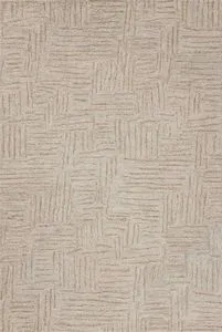 Neutral-toned Polly Smoke/Sand rug with a modern gridded pattern in wool and jute pile