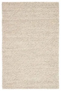 Chunky-knit wool area rug in solid gray and white with a clean Scandinavian style