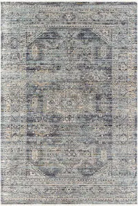 Margaret vintage style area rug in blue and gray with subtle beige accents and distressed detailing