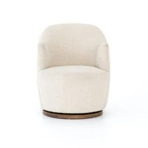 Front angle showing full upholstery and base of natural cream swivel chair