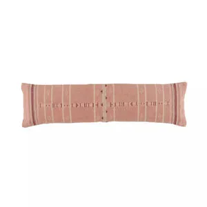 Long rectangular lumbar pillow with a blush cotton weave and cream tribal embroidered stripes and accents